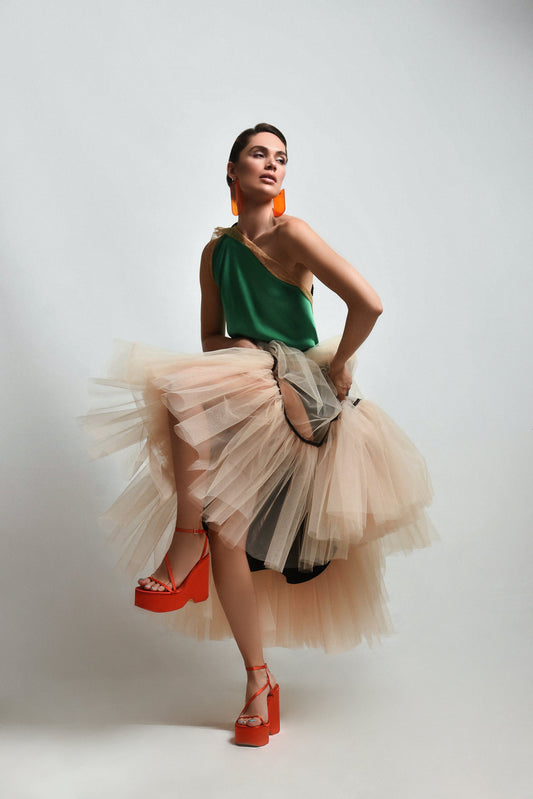 Green halter top with lace on the edges and a layered tulle skirt