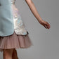Sleeveless dress with high neckline with pink tulle skirt