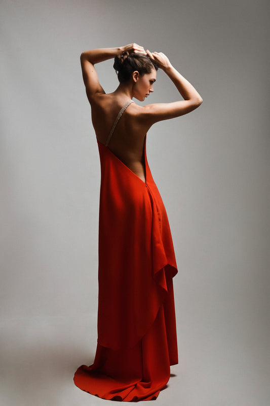 Red dress with an open back and belt with stones sewn by hand