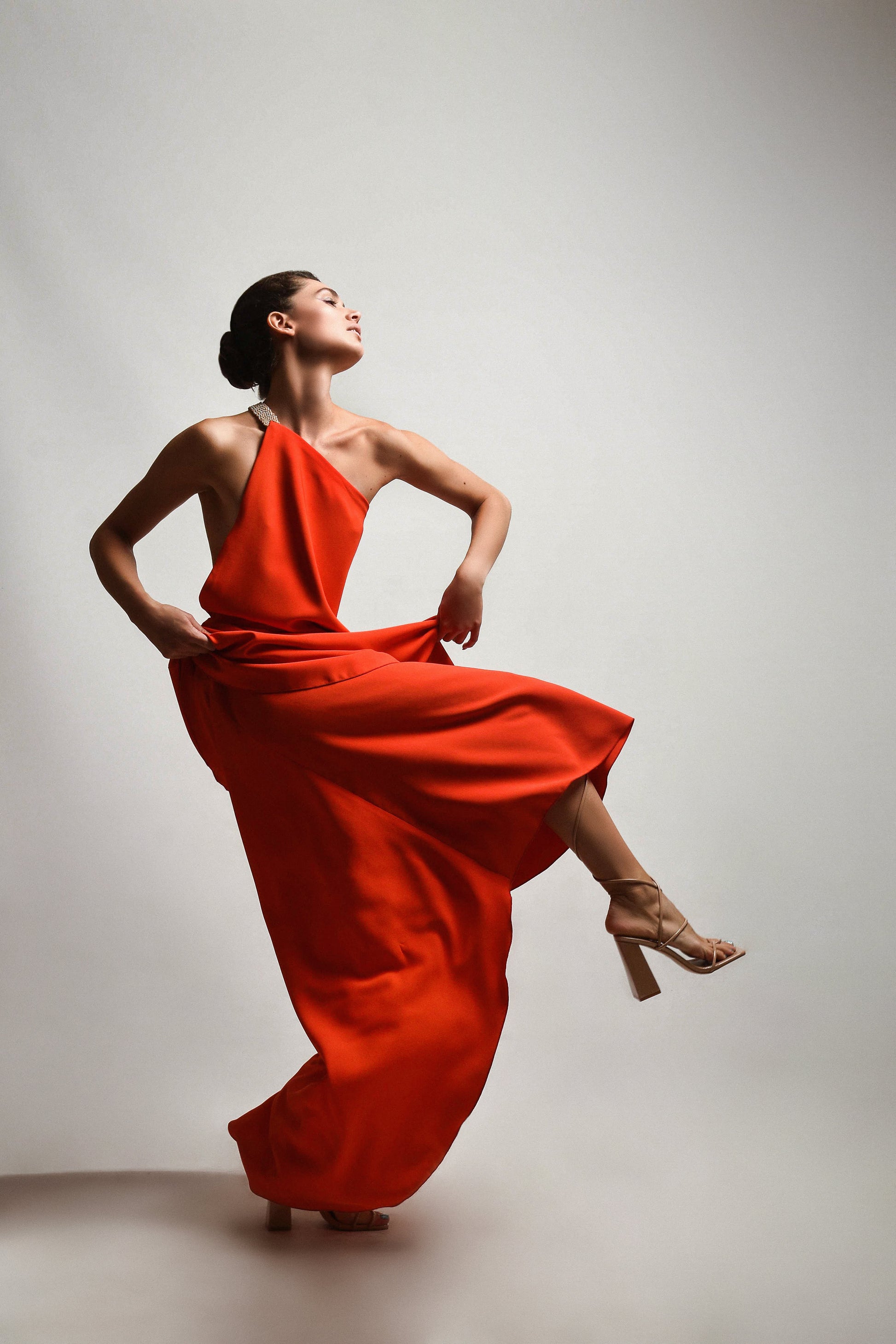 Red dress with an open back and belt with stones sewn by hand FLUTURA DEDINJA Red dress with an open back and belt with stones sewn by hand FLUTURA DEDINJA