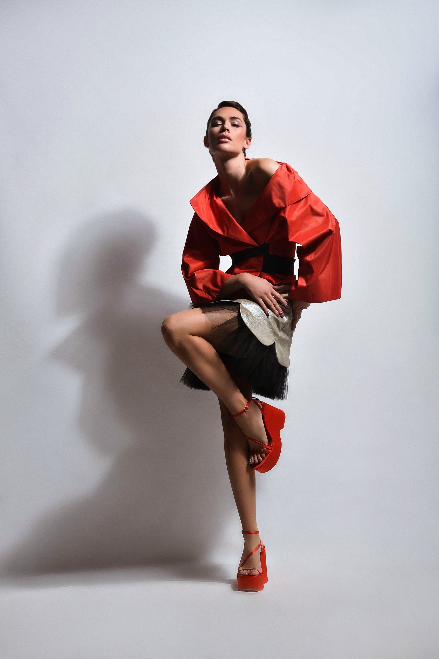Dress made of red kimono and short skirt combined with tulle and bright material