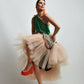 Green halter top with lace on the edges and a layered tulle skirt